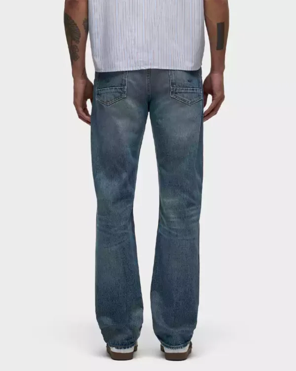 A medium dark indigo wash denim jeans