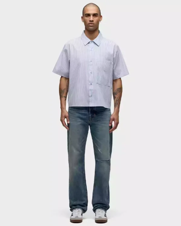 A medium dark indigo wash denim jeans