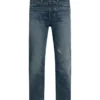 A medium dark indigo wash denim jeans