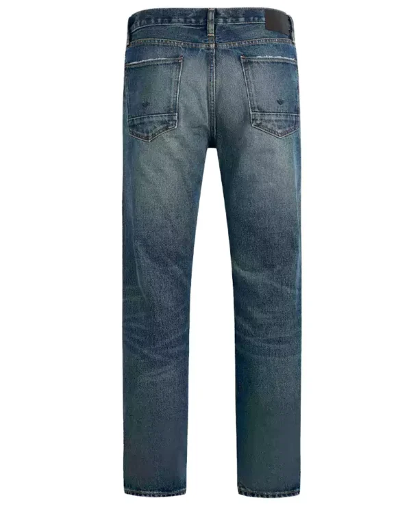 A medium dark indigo wash denim jeans
