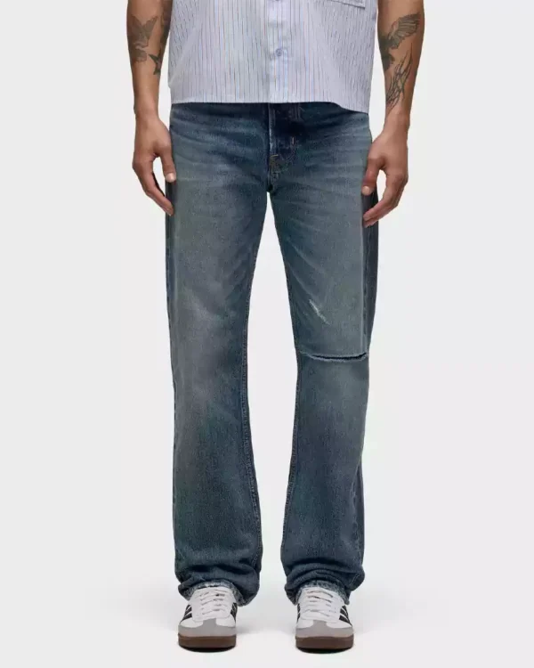 A medium dark indigo wash denim jeans