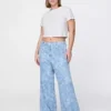 Baggy jean with an allover floral print Baggy jean with an allover floral print