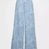 Baggy jean with an allover floral print Baggy jean with an allover floral print
