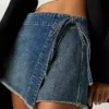 Denim mini skirt with a frayed hem