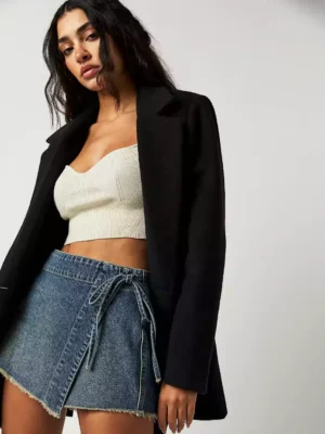 Denim mini skirt with a frayed hem