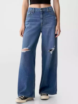 Destroyed medium indigo wash denim jean