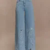 Embroidery on denim jeans