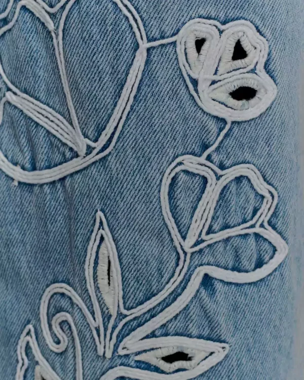 Embroidery on denim jeans