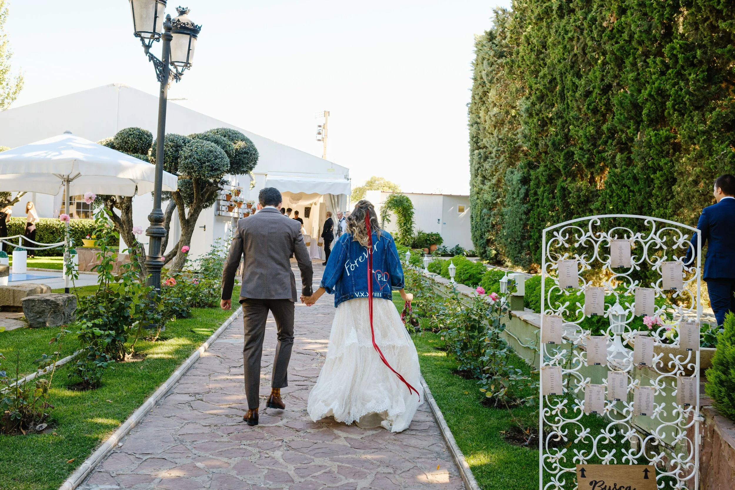 How amazing does our customised jacket look. Lara our bride really nailed her bohemian bride look. We specially love how she matched the red ribbon from her crown to match the red of the heart we hand painted onto her jacket. Send us a message for y…