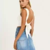 Medium wash denim mini skirt