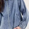 Blue denim bomber jacket