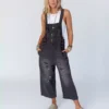 Distressed denim overalls