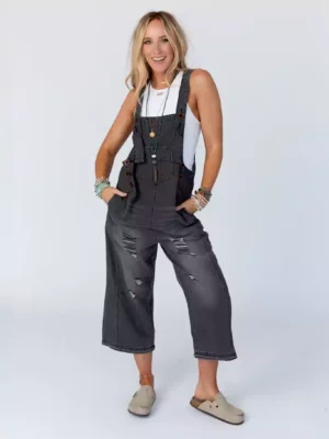 Distressed denim overalls