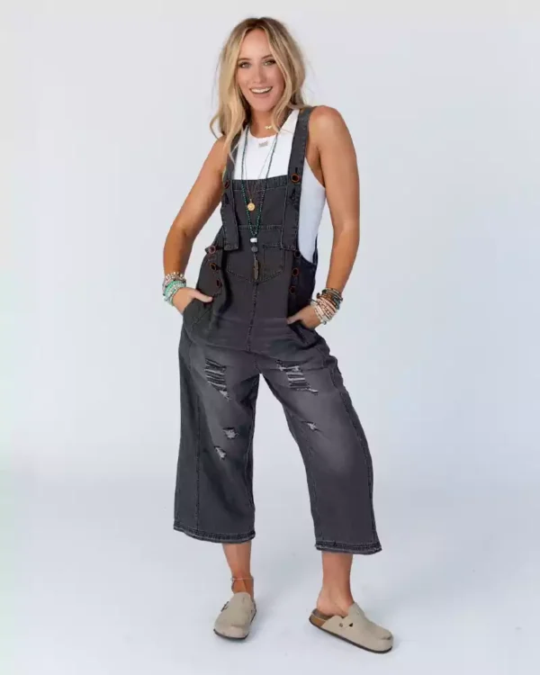 Distressed denim overalls