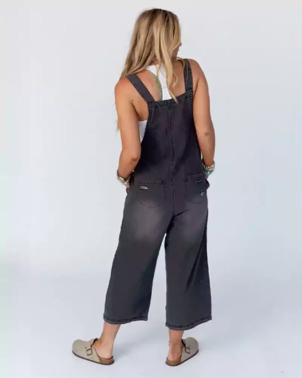 Distressed denim overalls