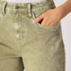 Green cast denim jeans