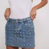 Studded denim mini skirt
