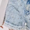 Denim shorts with rhinestone fringe