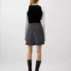 Denim skirt with frayed hem