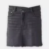 Denim skirt with frayed hem
